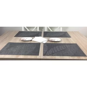 All four tablemats with centre piece. Woven vinyl Fleximats Sable design by Plymouth Pottery