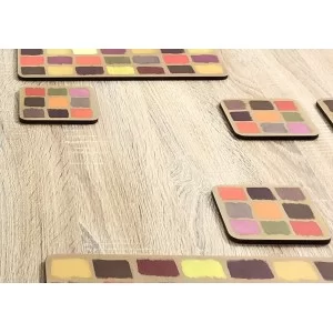 Close up of Harlequin coasters, corkbacked design by Plymouth