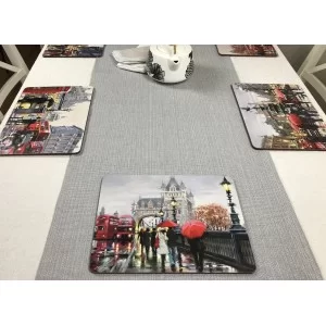 Wide view of Streets of London corkbacked placemats on grey runner