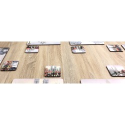 Close up of Streets of London corkbacked coasters on wooden dining table