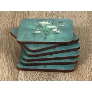 Infinity corkbacked floral coasters stacked up