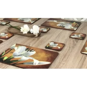 Placemats Lily Sunburst orange background, corkbacked floral design with white flowers