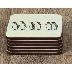Set of 6 Penguin Parade drinks coasters by Plymouth Pottery neatly stacked