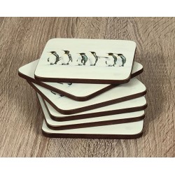 Set of 6 Penguin Parade drinks coasters by Plymouth Pottery fanned out