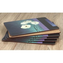 Stacked display of Plymouth Pottery Timeless white flowers set of 6 tablemats with cork base showing