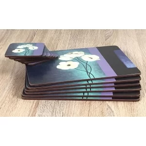 Timeless drinks coasters by Plymouth Pottery on top of matching placemats