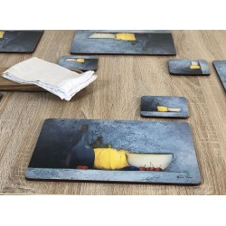 Blue Harmony corkbacked drinks coasters on wooden table with white napkin