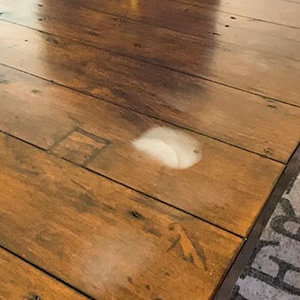water stain on wooden table without using coasters